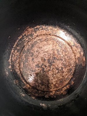 Bottom of pot after a few uses and regular cleaning.  Pot was not scraped.