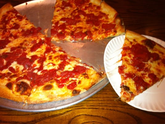 Grandma pizza, chunky tomato, garlic, and cheese