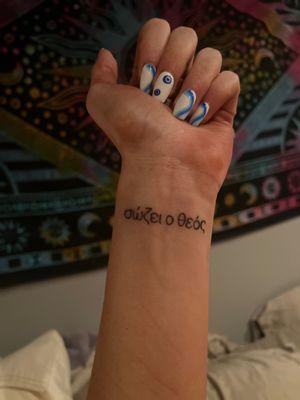 This is my newest tattoo only a day old from Matt. It says God saves in my family's language- greek.