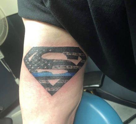 I was called a superhero by a person that I worked with and supported.Artwork by Kevin Graf of Goathead Graffix tattoo