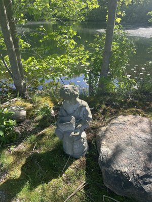 Cute statues by the pond