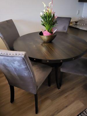 Table and chairs from Bellagio furniture