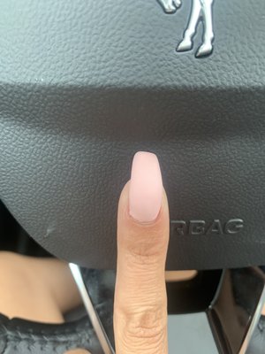 Why is my nail slanted? Also does this look like coffin?