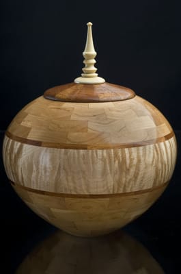 Segmented wooden cremation urns