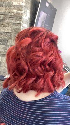 Red, shoulder length, curly hair