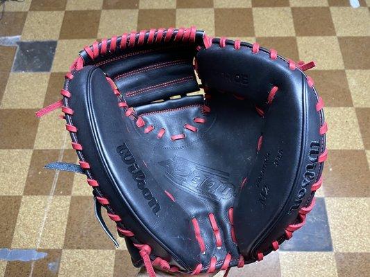 New glove that was re worked with new lacing on the whole glove as well as re lacing in the palm/pocket area, and padding added.