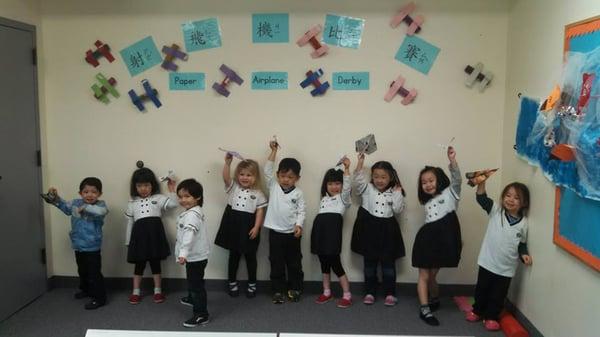 3 years old class children had paper airplane derby for the theme of Transportation.