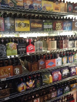 One of multiple shelves of beer