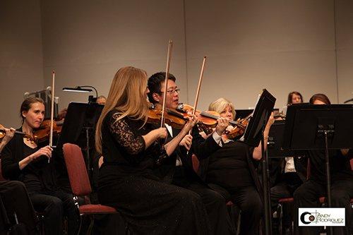 Concertmaster LeAnn Contessa leads a fantastic string section!