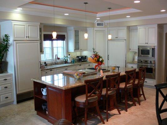 Painted kitchen with cherry island.