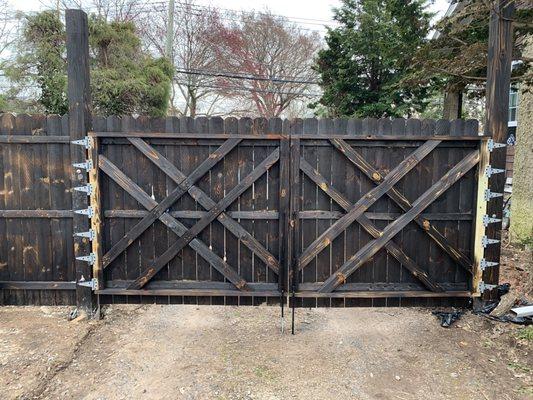 Custom built wood double gate built to last with sho sugi bon finish.