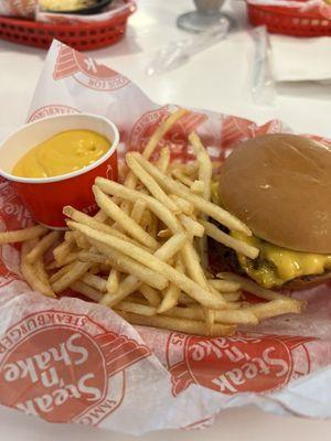 Double steak, burger, fries, and cheese sauce