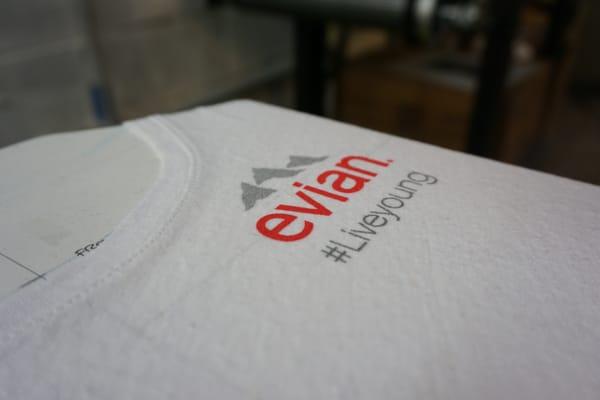 3 color front / 2 color back on client supplied Urban Outfitters burnout tee's for Evian.