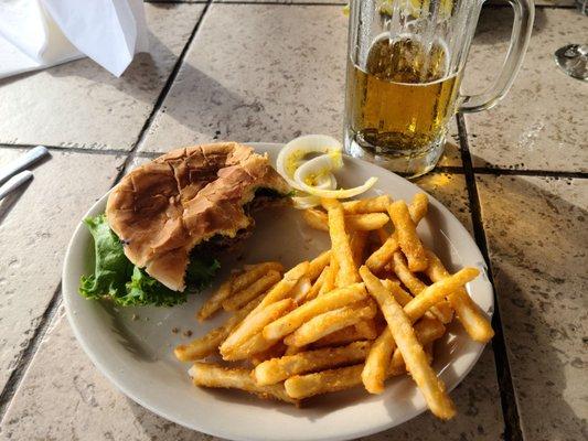 The mediocracy of this burger was nothing to write home about, but that fly loved it!