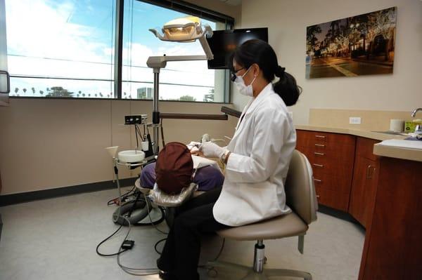 One of our hygienists Mirma working on a patient