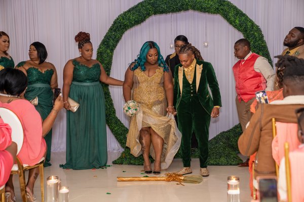 Jumping the broom into their new life together