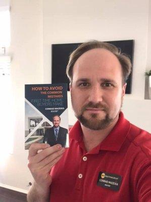 Conrad with his First Time Homebuyer Book