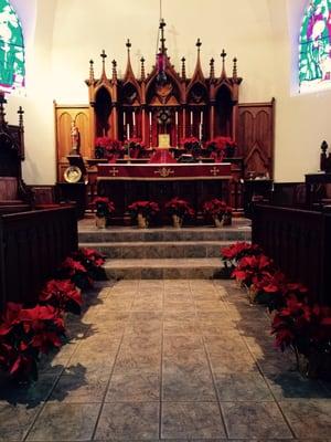 Facing the altar decorated for the Epiphany of Christ.