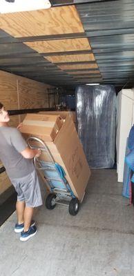 Movers working hard at their job.