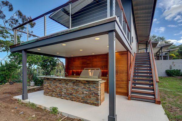 Who doesn't want an outdoor kitchen? This is solid Teak and we love this look!