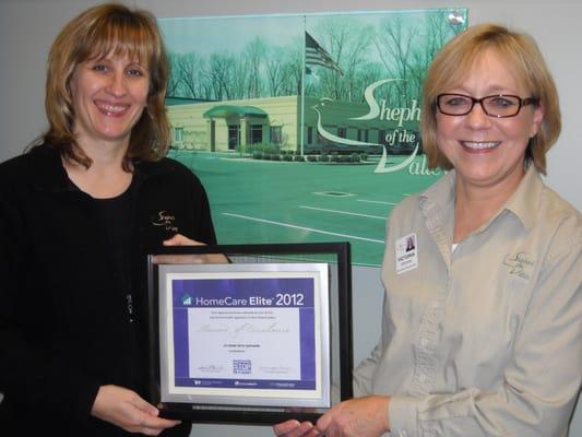 Kris Siciliano, RN, AHWS Director, and Victoria Brown, Shepherd CFO, receive excellence award from HomeCare Elite.