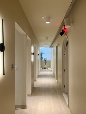 Amazing hallway with modern lighting and decor!