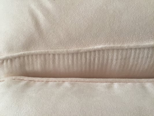 fabric pulling at each stitch