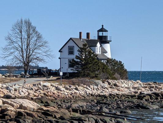 Prospect Harbor Point Light across the beach