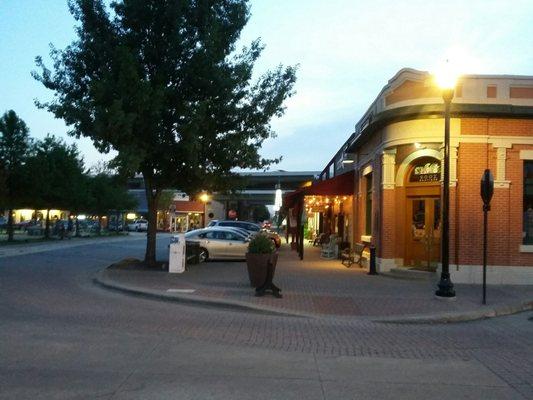 there are little shops and restaurants around the town square.