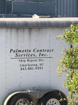 Company trailer parked in Detyen's Boatyard