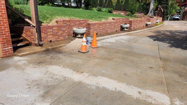 Reinforced brick retaining wall