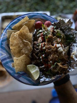 Baked Potato smothered with marinated chicken + beef and all the fixings! Too much flavor to handle...