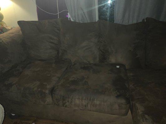 Simple brown couch (used) unit 52 river bend mobile home community.