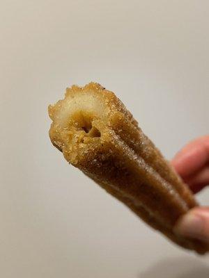 1 Churro, caramel/Dulce de Leche filled. Not too sweet, more milk flavored