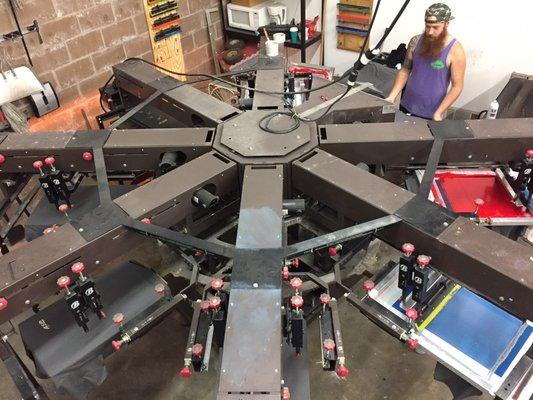 Sky view of automatic t-shirt press at Talkingink Custom T-shirts