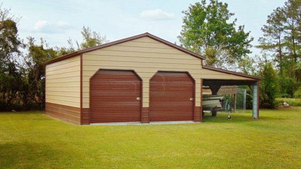 Steel Building with lean to and dutch cut roll up doors.