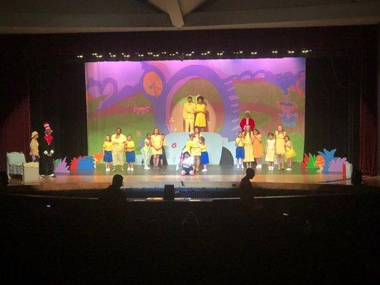 Elementary students performing with the high school cast of Seussical the Musical