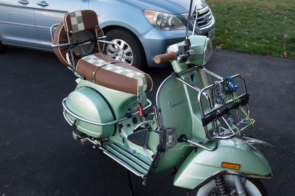 Vespa PX with customized checkers seat cover, spare tire cover and backrest pad cover