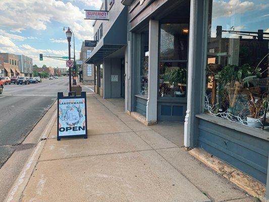 View of the Lakota Made store from Riverfront Dr sidewalk