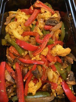 Veggie fajitas! 
Baby portobello, cauliflower, onion, red and green peppers