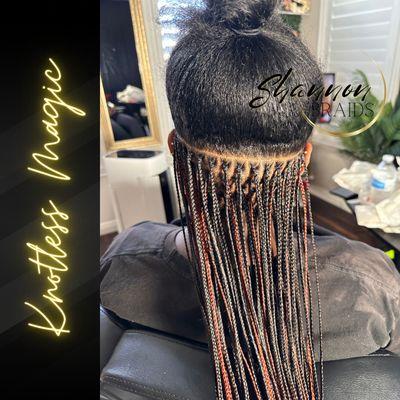 Discover the meticulous artistry of extra small knotless braids at ShannonBraids, where every detail is crafted with care.