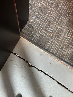 Cracks in the foundation on the fifth floor stairwell