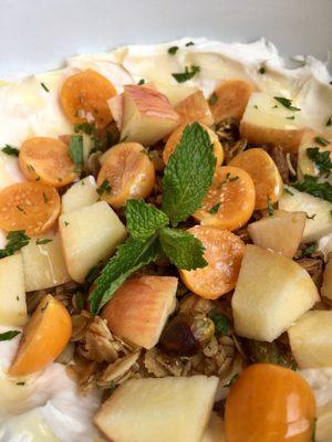 Granola with Greek yogurt, gooseberries, Apple, honey and mint