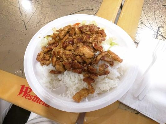 Teriyaki chicken over rice with cabbage