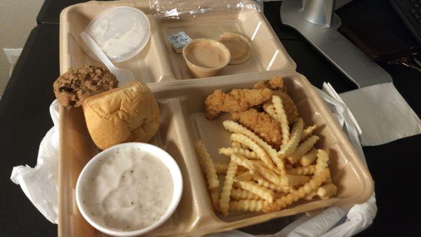 Chicken tenders, fries, roll, gravy