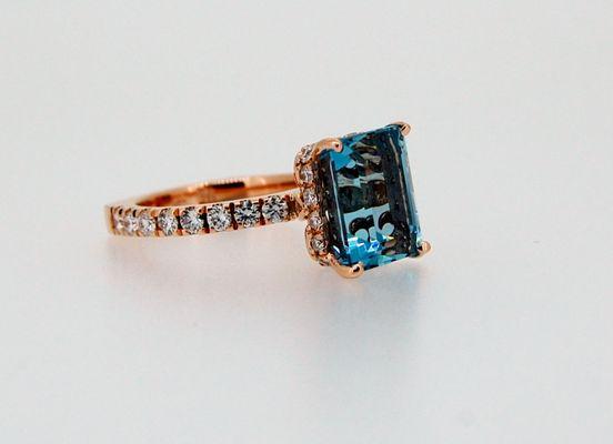 A beautiful aquamarine, with a rich tone is set in rose gold.