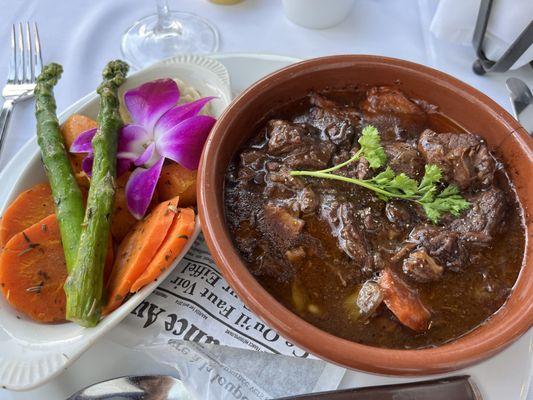 Beef Bourguignon, $43.  Excellent flavor, huge portion.  Could use a better plating option so the veggies could be cut up