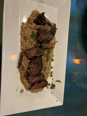 Steak tip risotto with caramelized onions and great hill bleu cheese