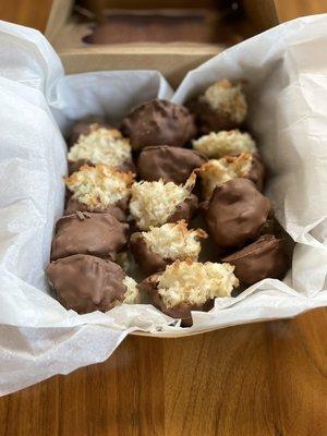 Custom order of chocolate dipped coconut macaroons.