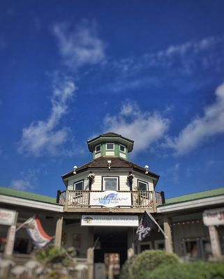 This is the front of Salty Hair Salon Obx at the Buccaneer's Walk Shopping Center.